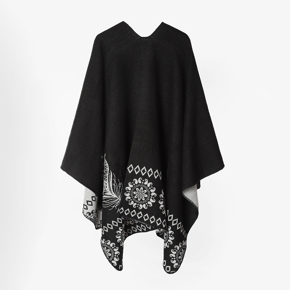 Dam poncho cape med two-tone woven texture, floral medallion jacquard, och öppen front.