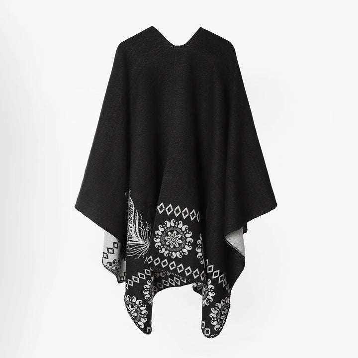 Dam poncho cape med two-tone woven texture, floral medallion jacquard, och öppen front.