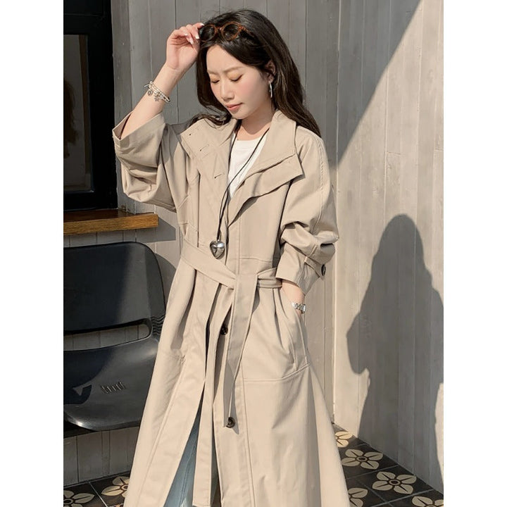 Dam längre lighter trenchcoat in oversize stil med straight skärning och dold knappslå