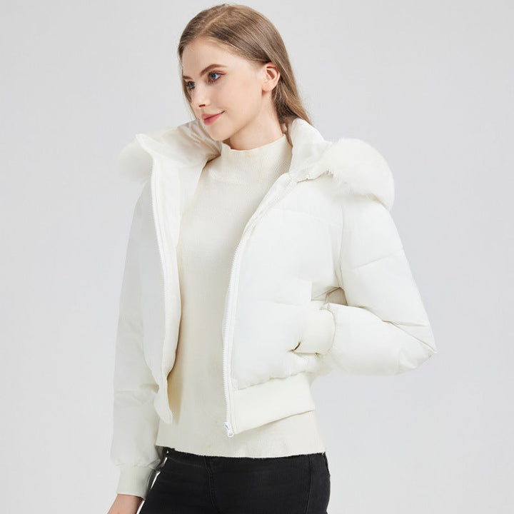 Dam kort quiltad hooded jacka med faux fur kant och ribbed fåll