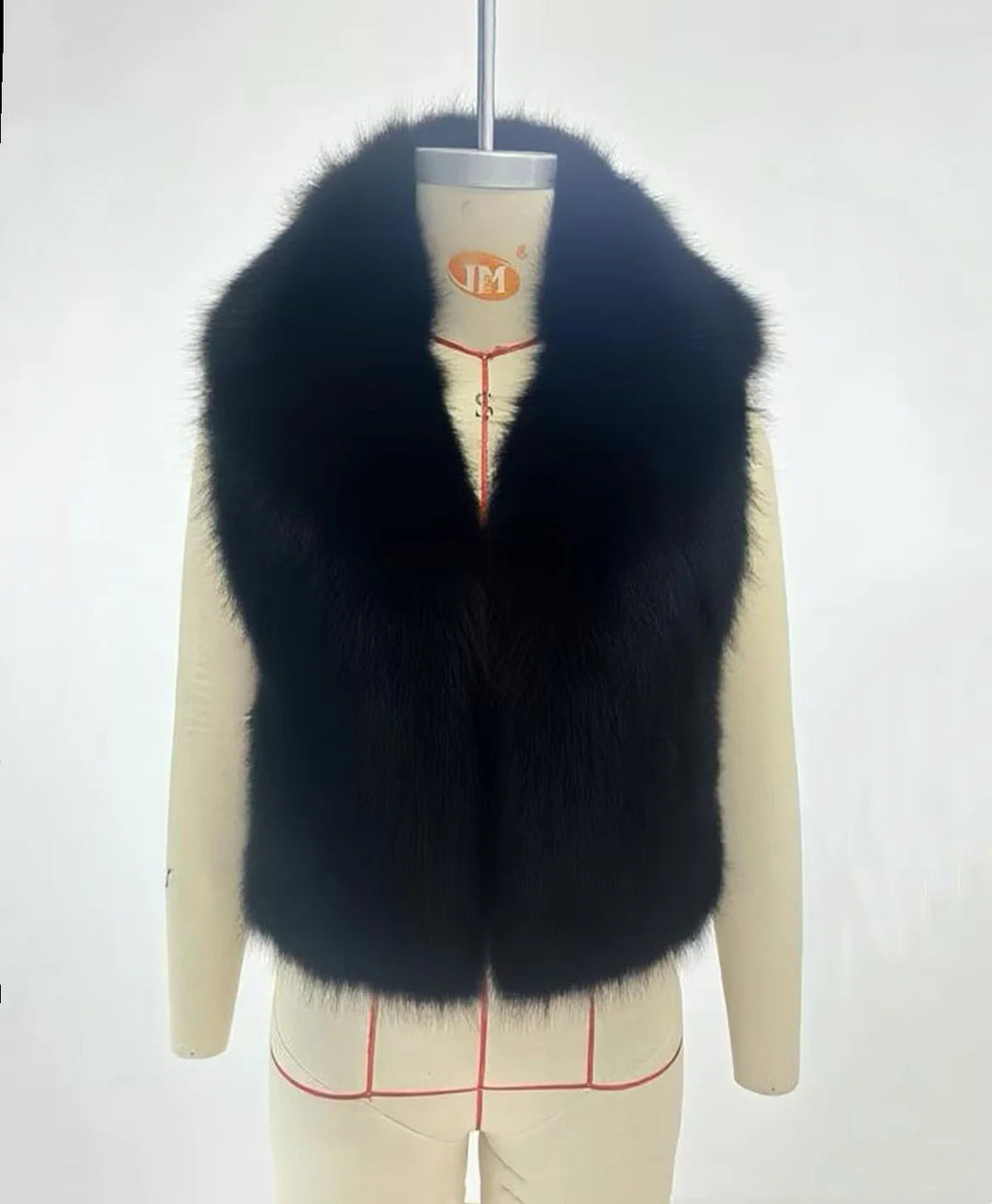 Dam lyxig faux fur väst med voluminous sjalkrage och cropped silhuett