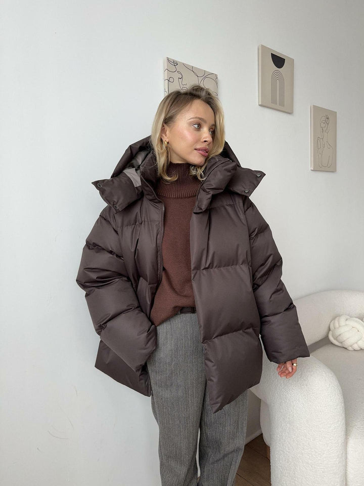 Dam oversize kviltad jacka med huva och vadderad värmande fyllning