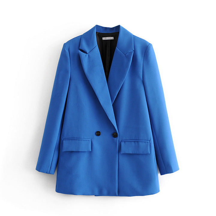 Dam figursydd lång blazer i oversized look med lapel krage och påsydda fickor
