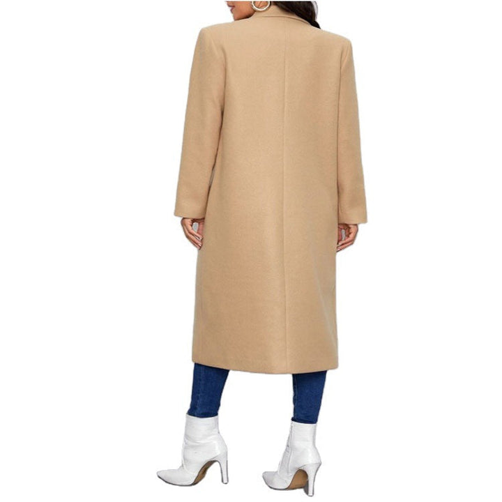 Dam Maxi Length Single Breasted kappa in minimalistisk Tailoring med dold knappslå och sidofickor