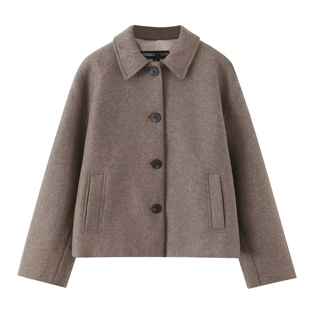 Dam kort-skärning blousonjacka tillverkad av ullblandning med skjortkrage och welt fickor