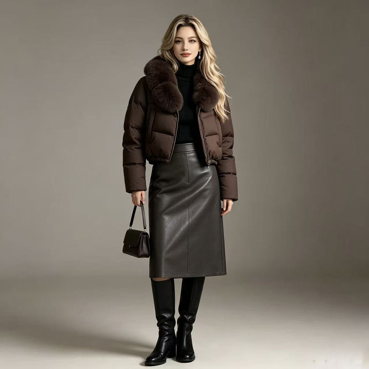 Dam kort kviltad kort pufferjacka med voluminous faux fur krage