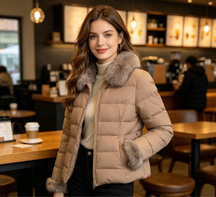 Dam kort skräddad vinter kviltad jacka med removable faux fur krage, tonal midja straps och dold två-way dragkedja
