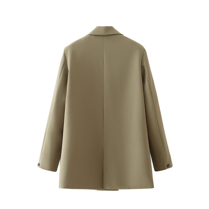 Dam figursydd lång blazer i oversized look med lapel krage och påsydda fickor