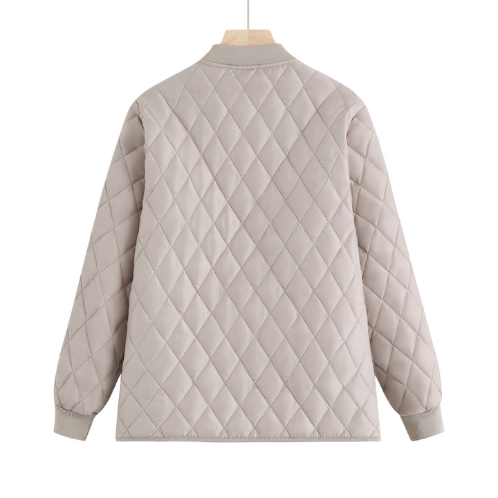 Dam quiltad övergångsjacka med diamond stitching och ribbed krage