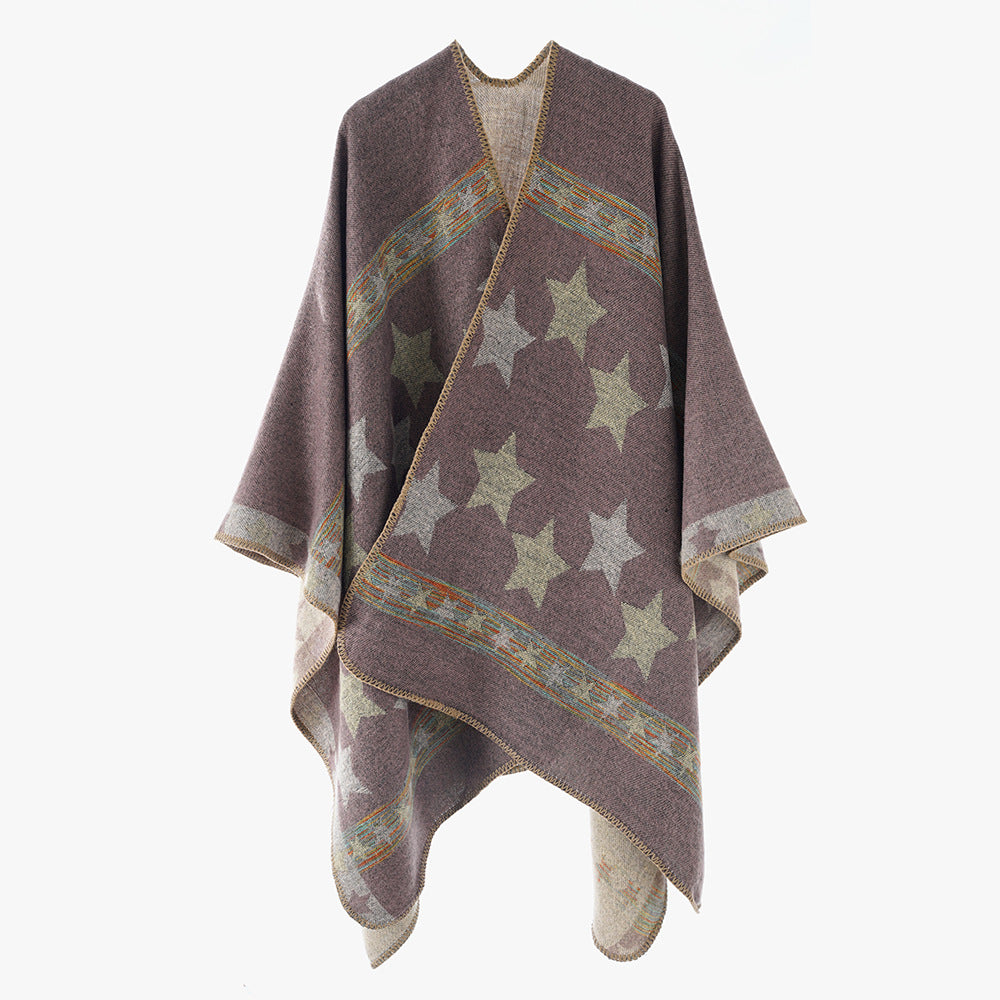 Dam Oversize capeponcho tillverkad av ullblandning med double-lagerplagg star jacquard och decorative overlock seam