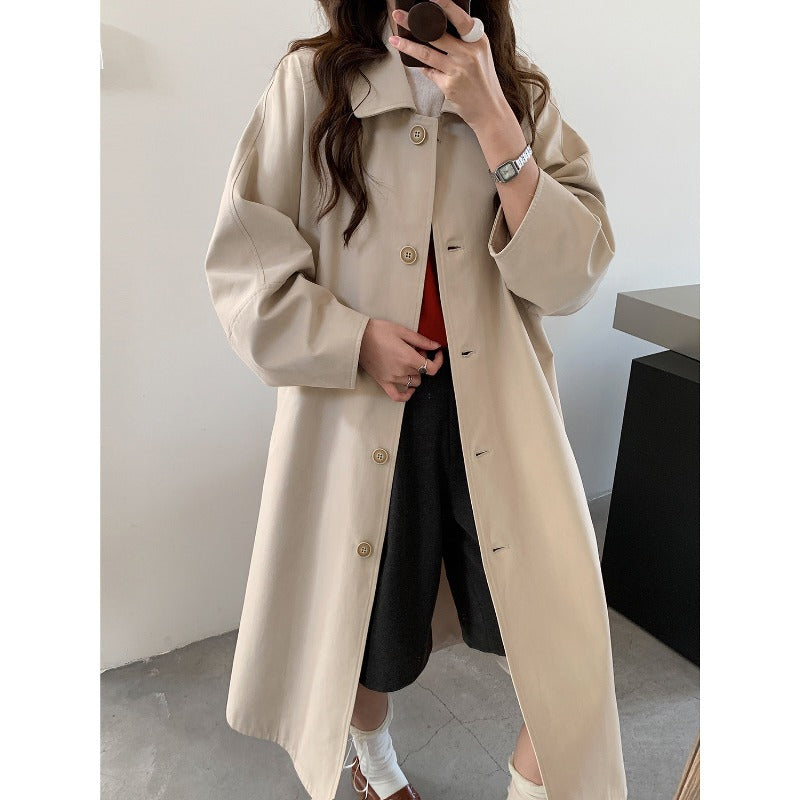 Dam lång oversize trenchcoat med vid skärning och klassisk Lapels