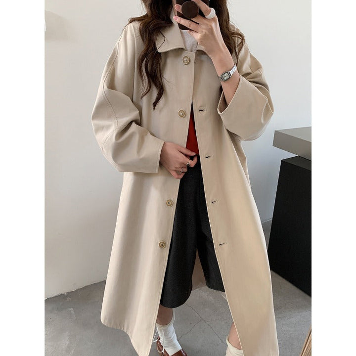 Dam lång oversize trenchcoat med vid skärning och klassisk Lapels