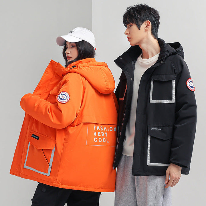 Dam parka jacka med huva, vadderad, reflective detaljer och stor cargo fickor