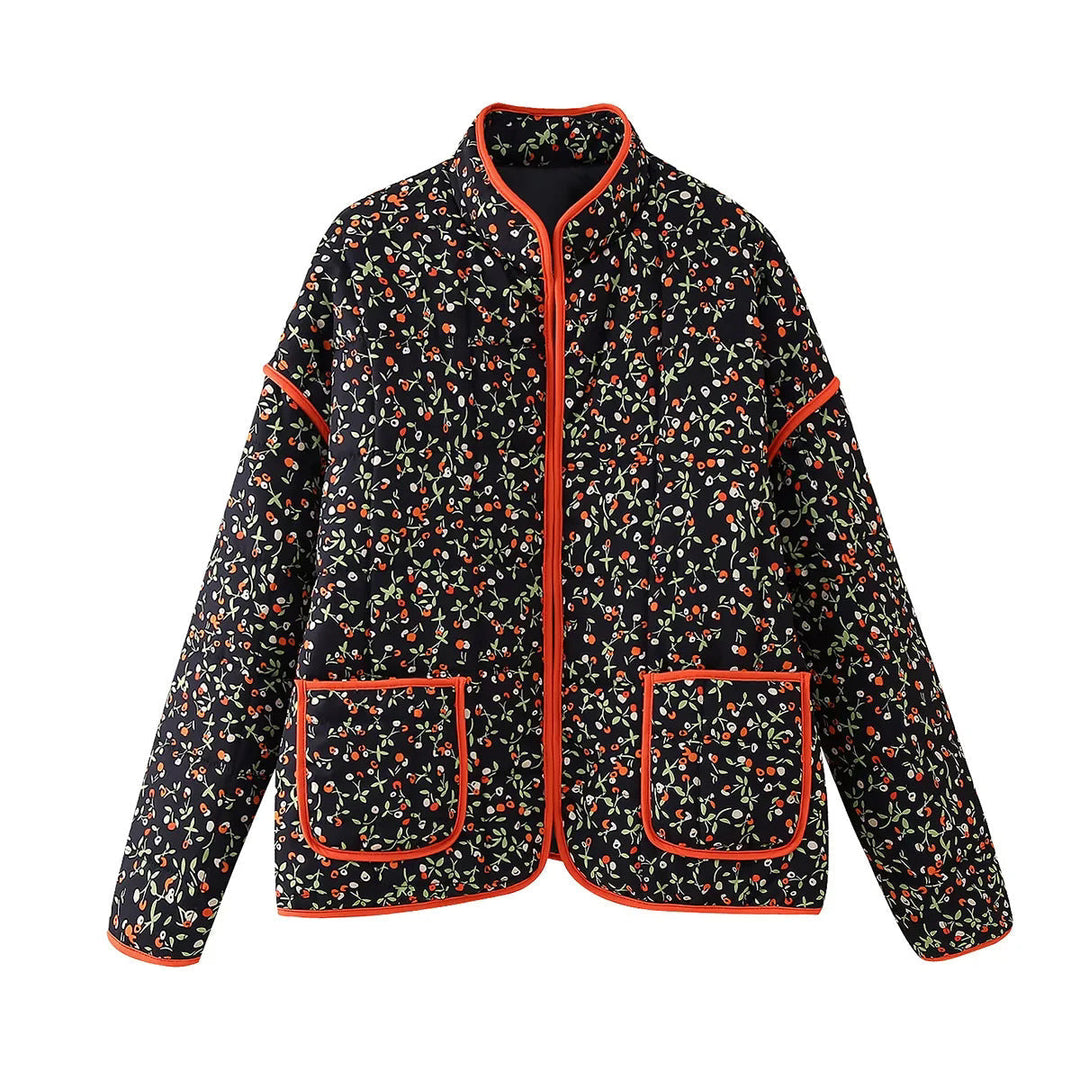 Dam quiltad floral jacka med ståkrage, dragkedja, och påsydda fickor