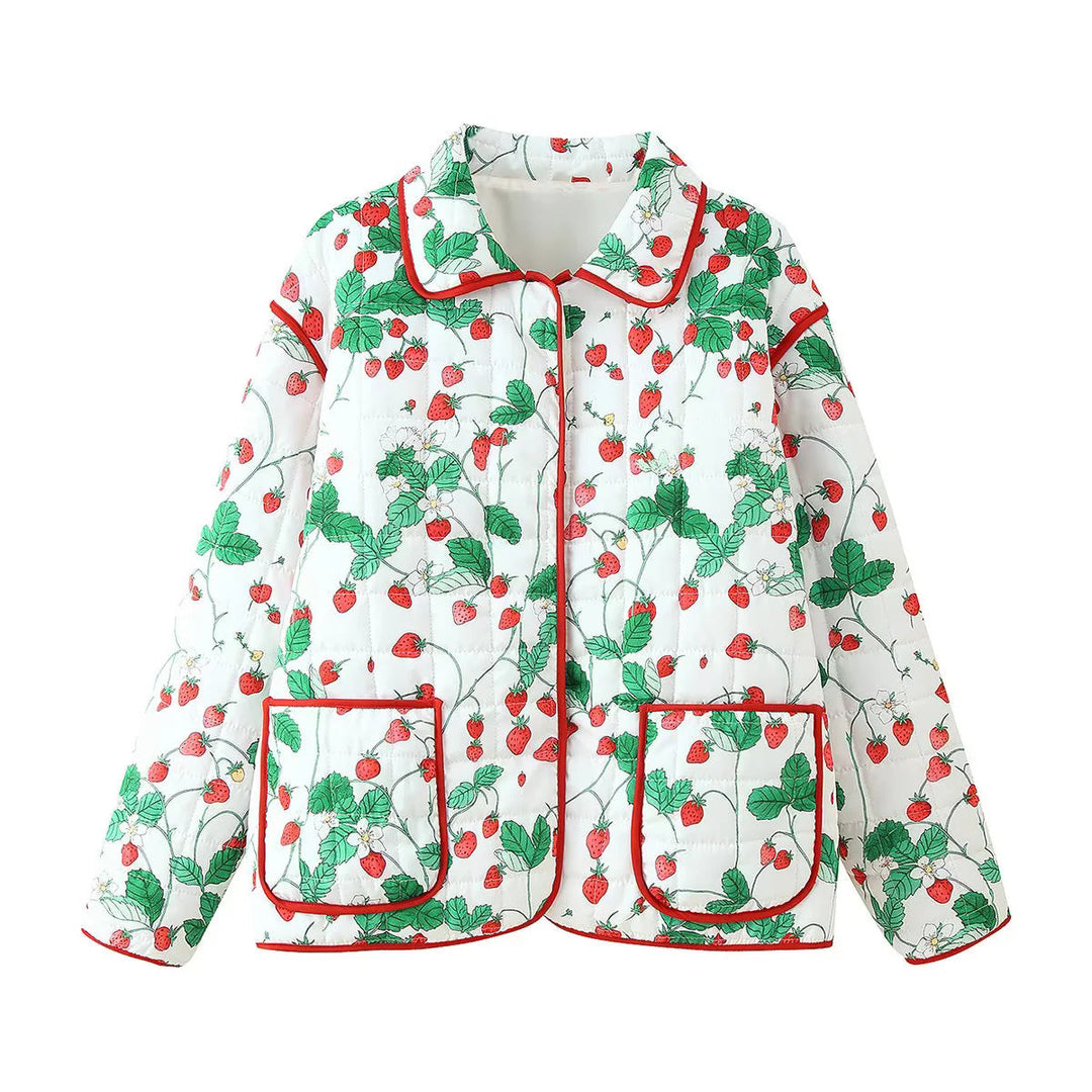 Dam quiltad övergångsjacka med strawberry motif, kontrasterande piping, och stor påsydda fickor