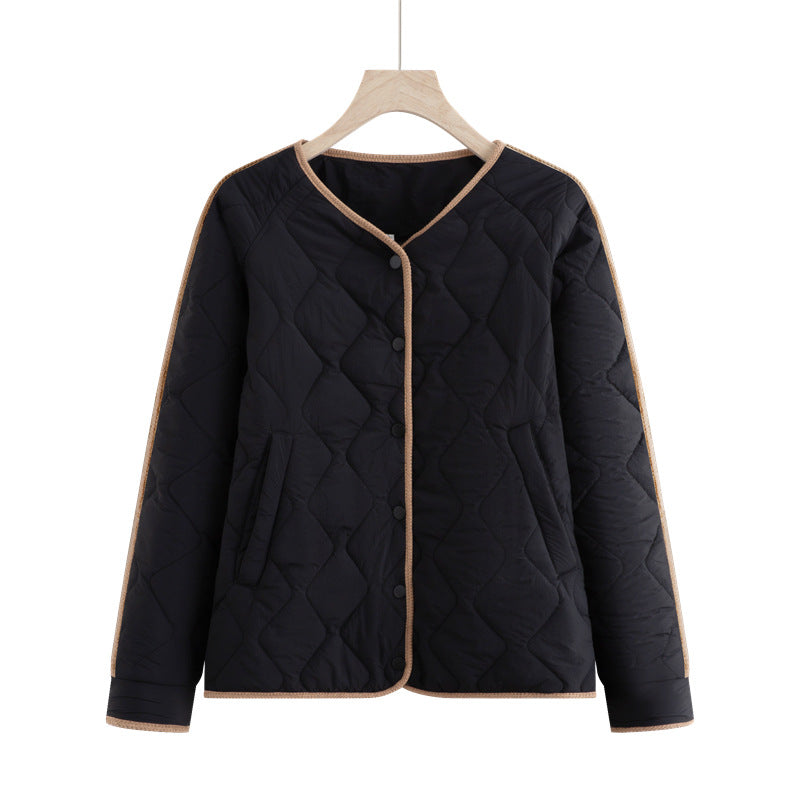 Dam quiltad övergångsjacka med diamond stitching, rund hals och press stud placket