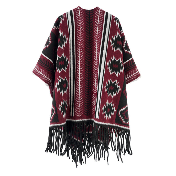 Dam Aztec-inspired fringe poncho cape i oversized rectangular skärning