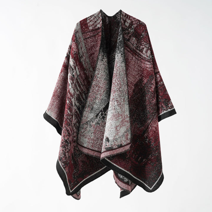 Dam jacquard stickad cape med textured woven look och öppen front