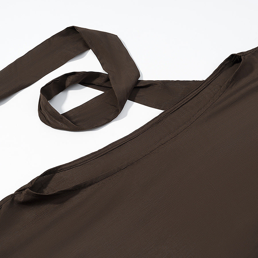 Dam fallande capeponcho med bow, asymmetrical pointed fåll och eyelet kant