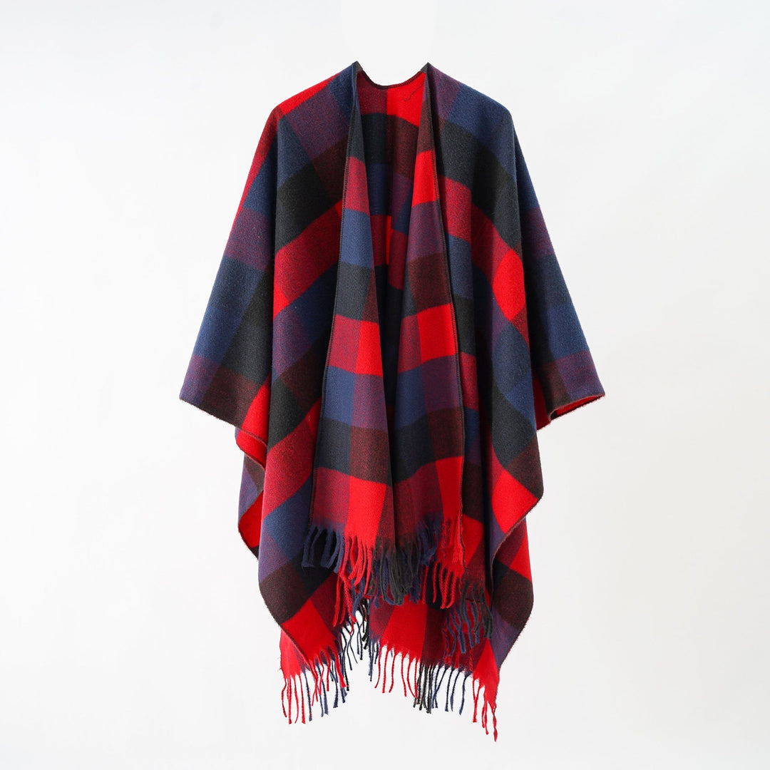 Dam Oversize Wrap poncho tillverkad av ullblandning med graphic diamond mönster och fringed fåll