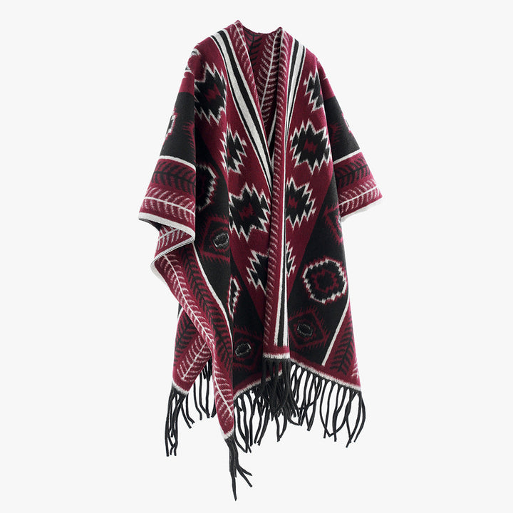 Dam Aztec-inspired fringe poncho cape i oversized rectangular skärning