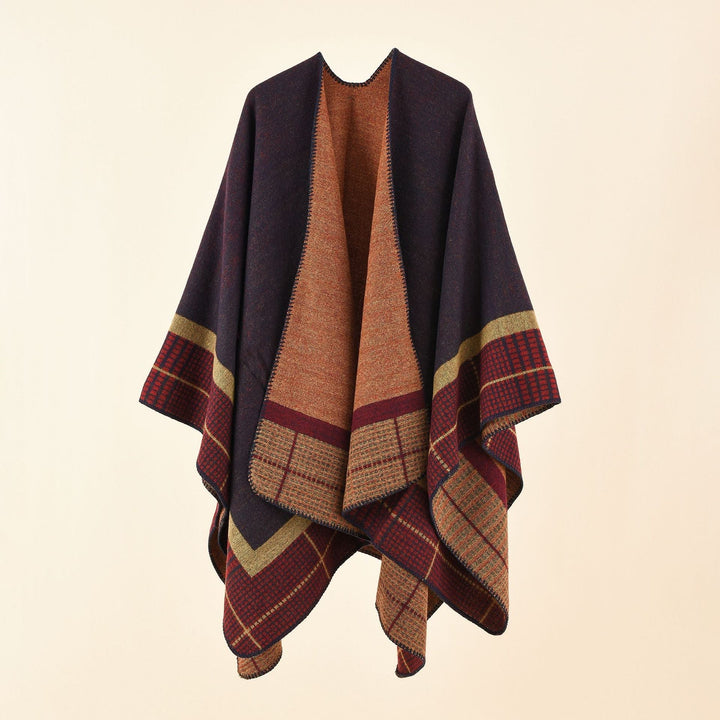 Dam Oversize capeponcho tillverkad av ullblandning med boxy fall och fine border structure
