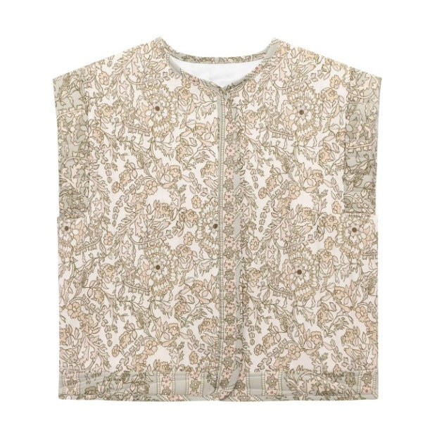 Dam quiltad väst med blommig design och praktiska fickor