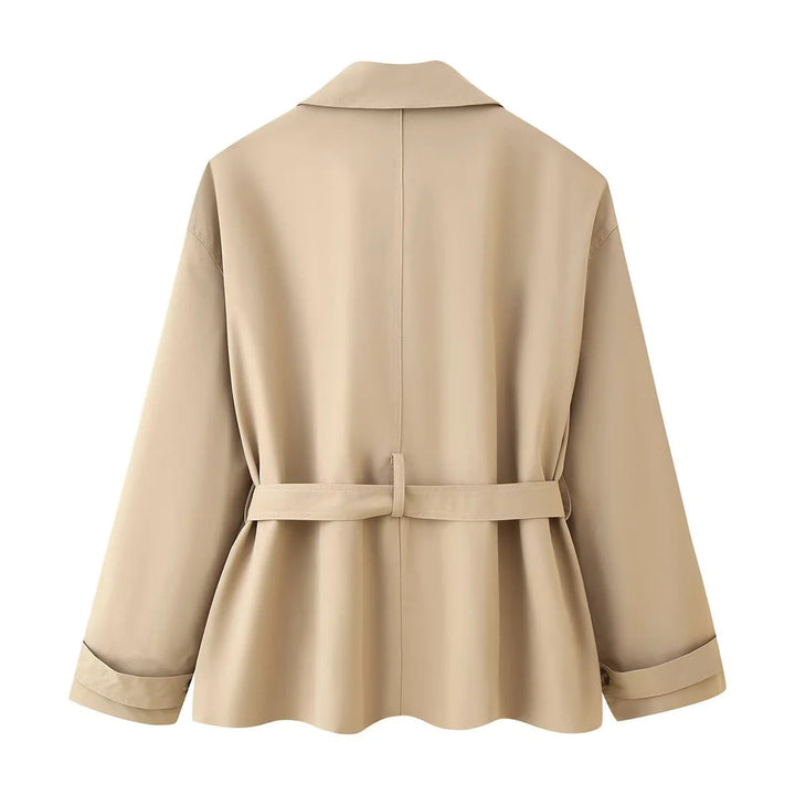 Dam figursydd kort trenchcoat med tie bälte, axel flaps och påsydda fickor