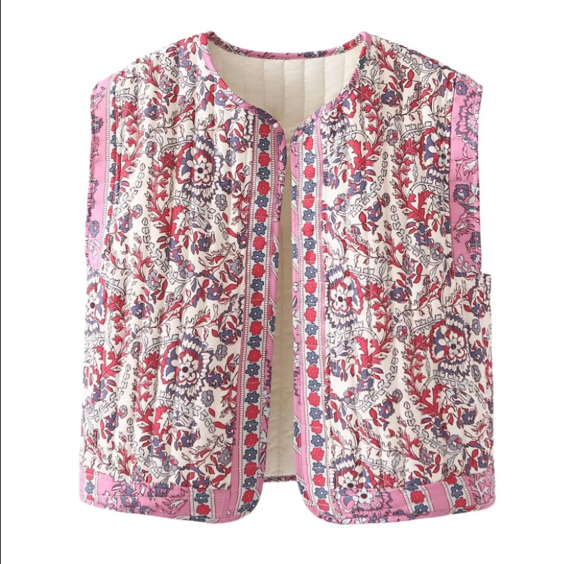 Dam quiltad väst med blommig design och praktiska fickor