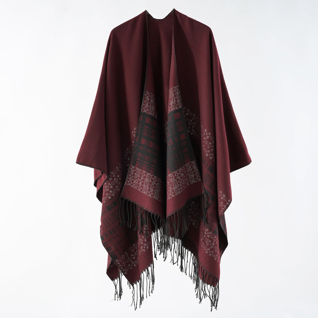 Dam ullblandning axel poncho med jacquard mönster och fransfåll