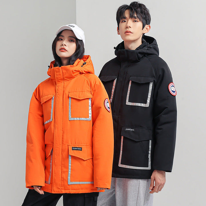 Dam parka jacka med huva, vadderad, reflective detaljer och stor cargo fickor