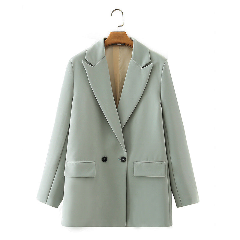 Dam figursydd lång blazer i oversized look med lapel krage och påsydda fickor