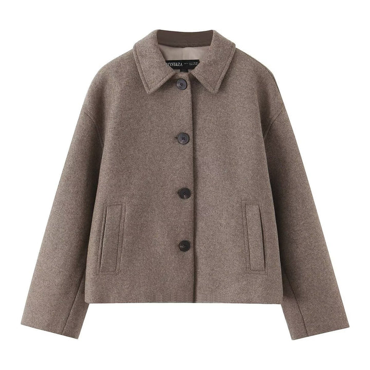 Dam kort-skärning blousonjacka tillverkad av ullblandning med skjortkrage och welt fickor