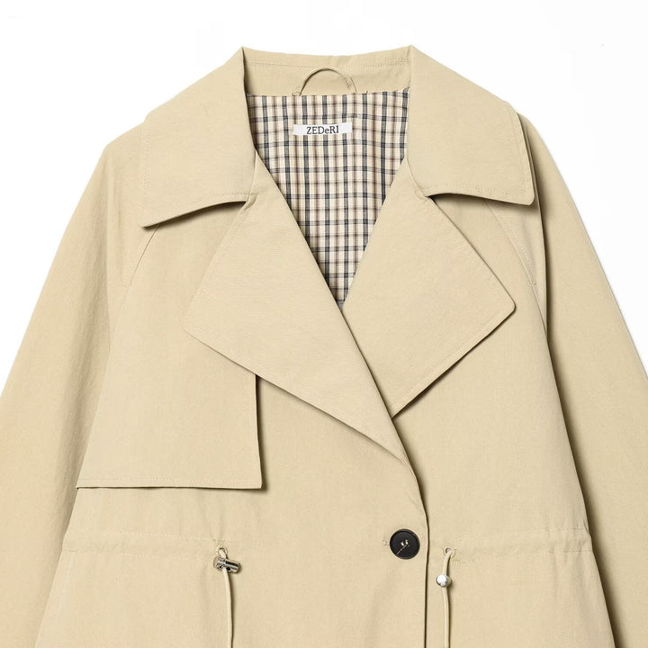 Dam Kort Oversize Trenchcoat med Drawstring Waist och Wide Lapels