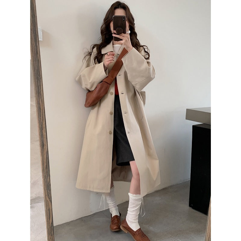 Dam lång oversize trenchcoat med vid skärning och klassisk Lapels
