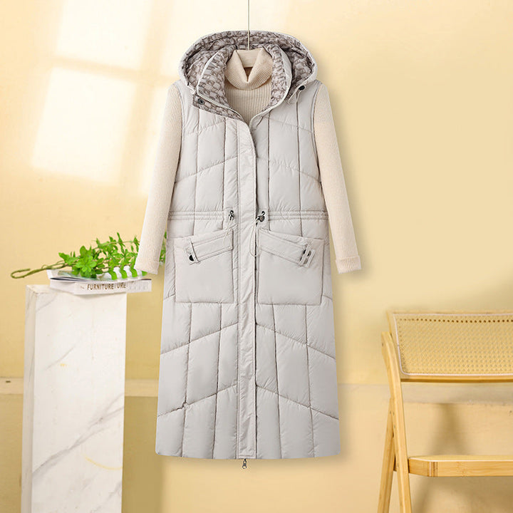 Dam lång sleeveless thermo quiltad kappa med huva, adjustable drawstring waist och multifunctional fickor