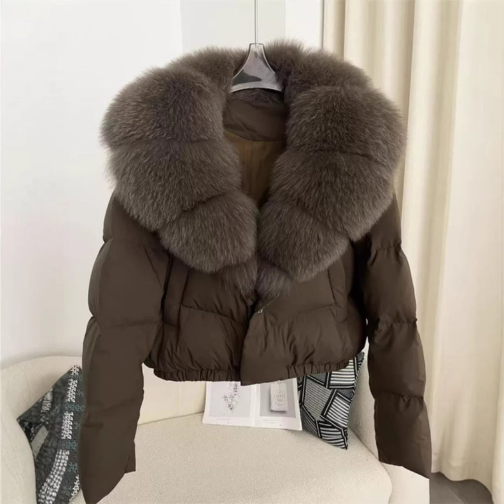 Dam kort skärning boxy pufferjacka med extra stor faux fur krage och shape-stable fåll