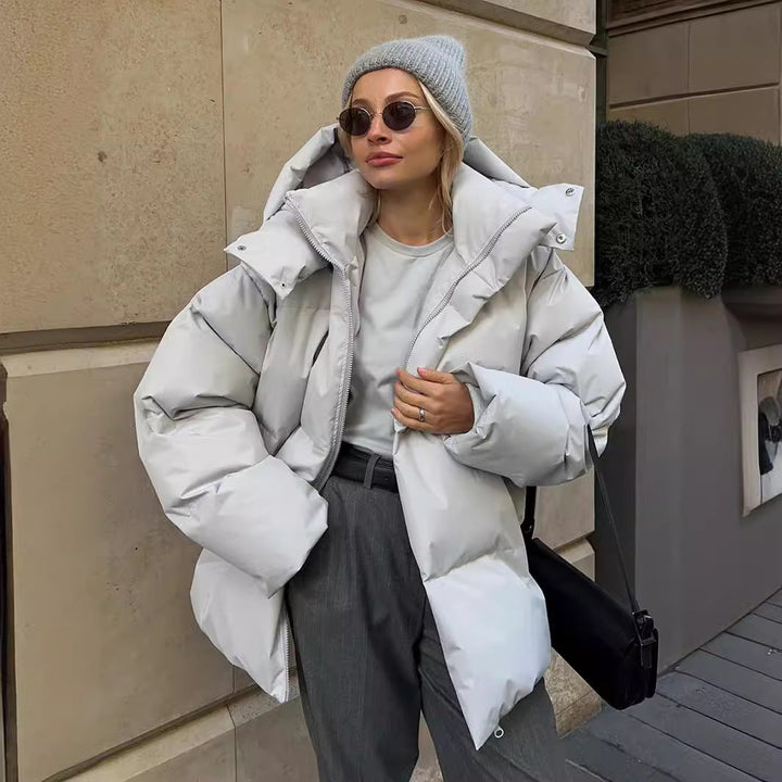 Dam oversize kviltad jacka med huva och vadderad värmande fyllning