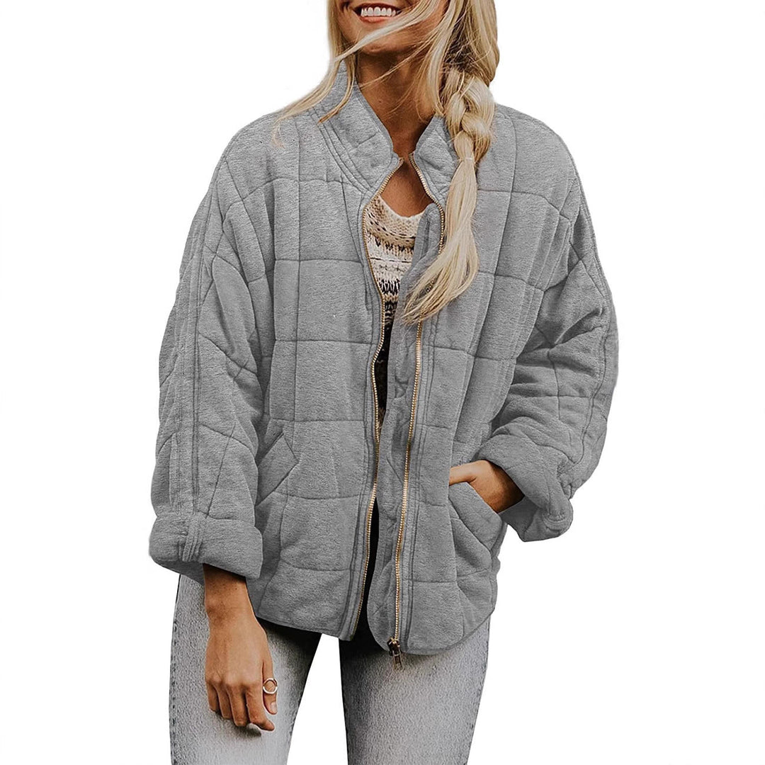 Dam vadderad oversize kviltad jacka med dragkedja och Slant fickor