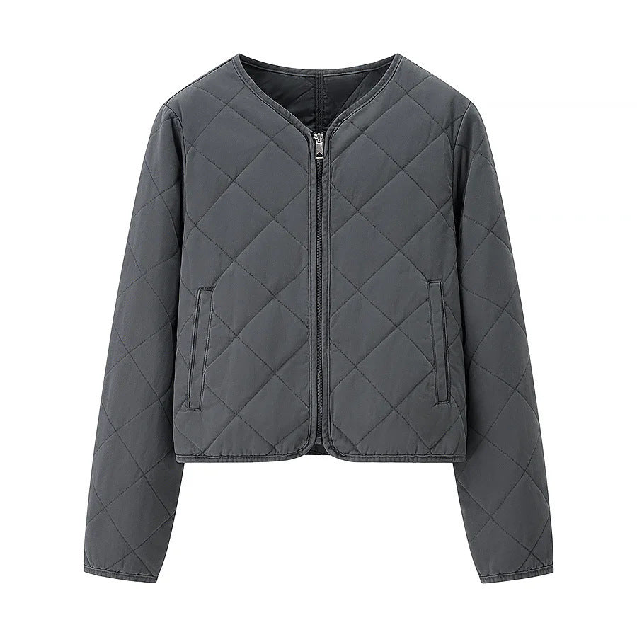 Dam kort jacka i boxy skärning med diamond quiltning, rounded fåll och concealed dragkedja