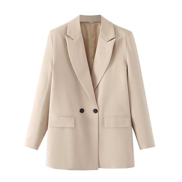 Dam figursydd lång blazer i oversized look med lapel krage och påsydda fickor