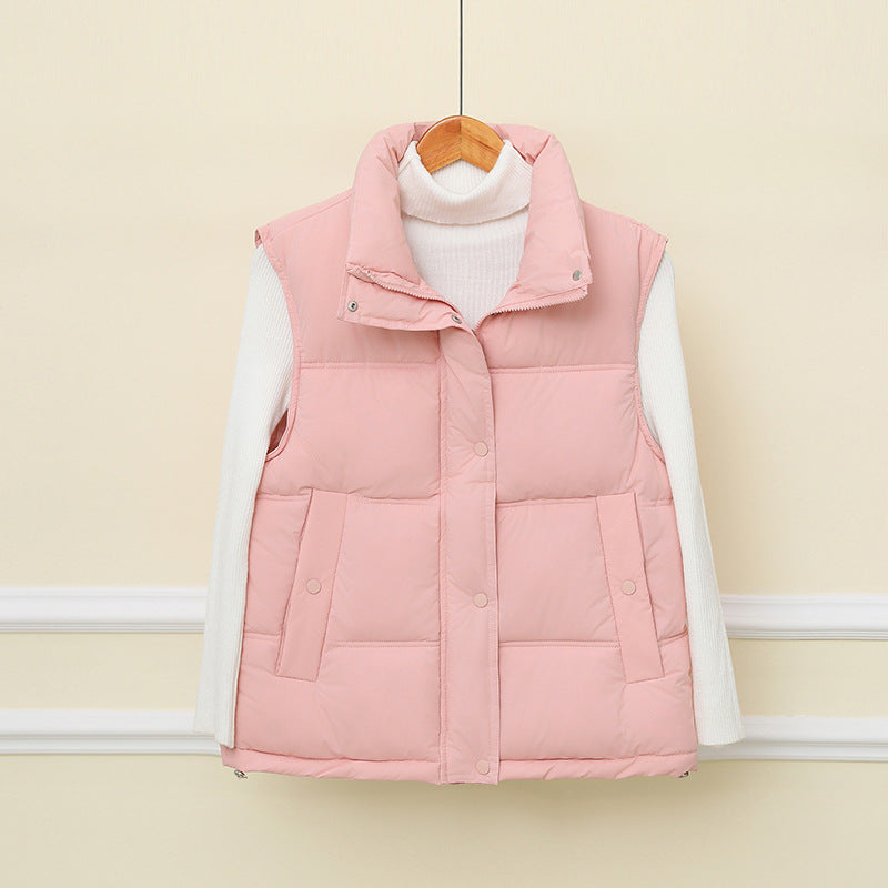 Dam non-vadderad sleeveless thermo quiltad väst med extra high standing krage och concealed snap knäppning