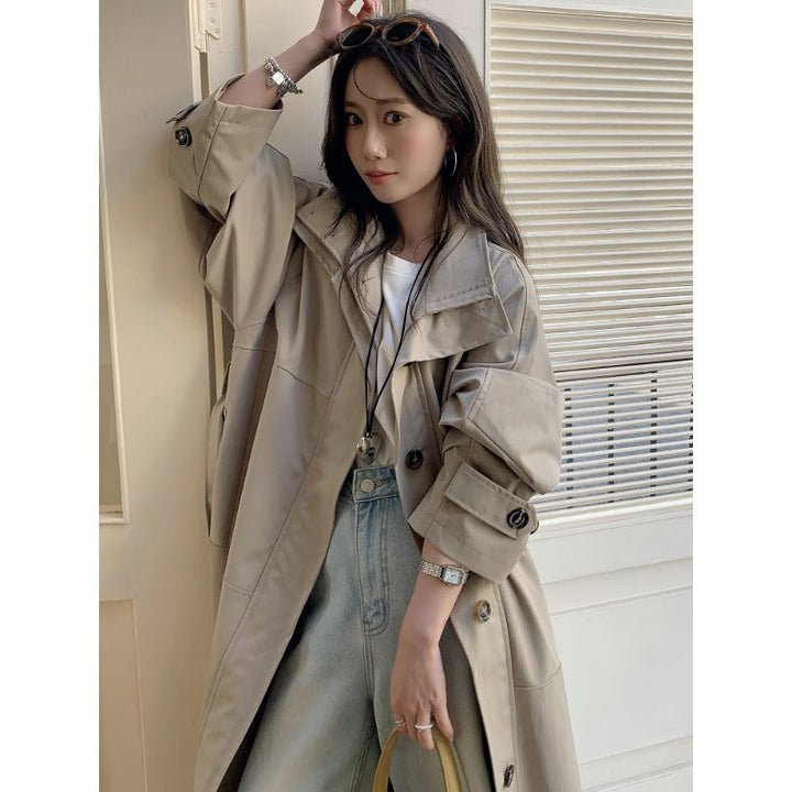 Dam längre lighter trenchcoat in oversize stil med straight skärning och dold knappslå