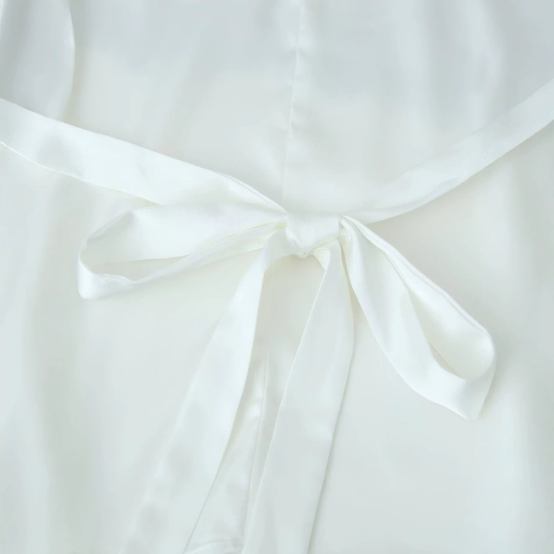 Dam shoulder cape med blommig lace edge och vid fall