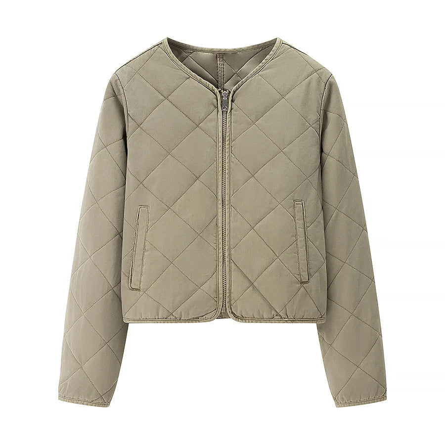 Dam kort jacka i boxy skärning med diamond quiltning, rounded fåll och concealed dragkedja