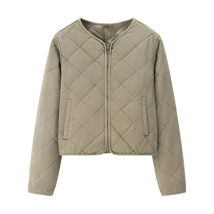 Dam kort jacka i boxy skärning med diamond quiltning, rounded fåll och concealed dragkedja