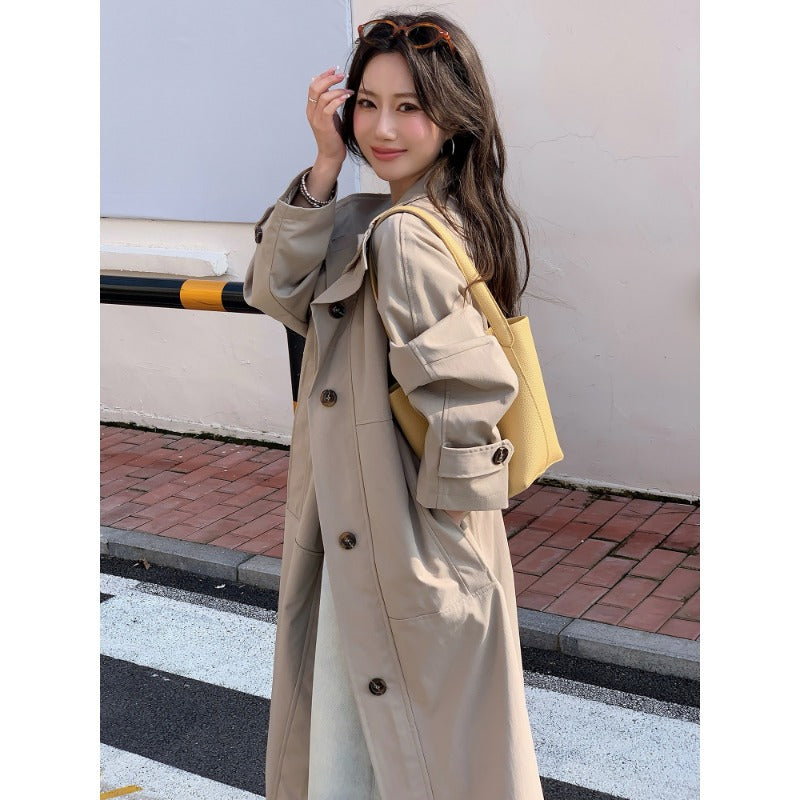 Dam längre lighter trenchcoat in oversize stil med straight skärning och dold knappslå