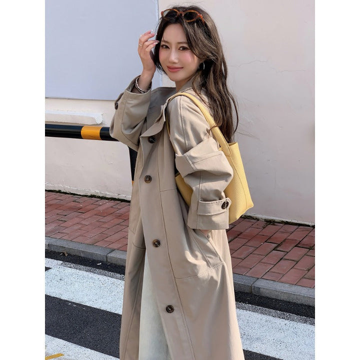 Dam längre lighter trenchcoat in oversize stil med straight skärning och dold knappslå