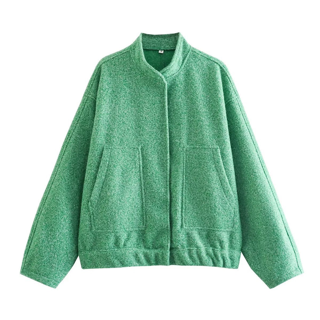 Dam oversized teddy kappa med ståkrage, påsydda fickor, och straight fåll