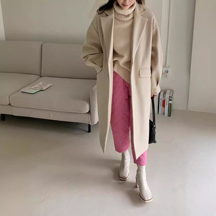 Dam lång modell ullblandning kappa med boxy oversizepassform och clean lapel